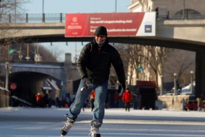 File photo: a man skates on the rideau canal skateway, the world's largest skating rink, during a period of subzero arctic weather in ottawa